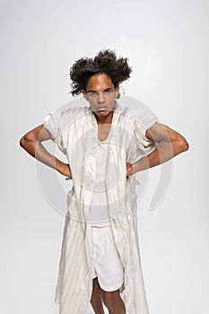 Curly African-American  on white background photo