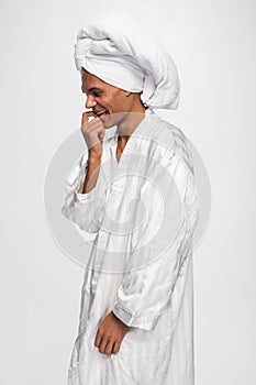 Curly African-American  on white background photo