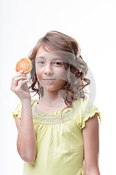 Curly brunette suggests sweet, nutritious oranges