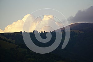 Cloud from behind the mountain