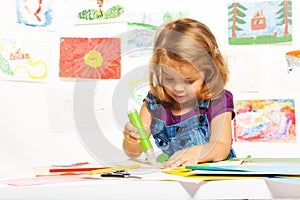 Curly girl with glue stick