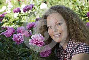 Curly girl and the peonies