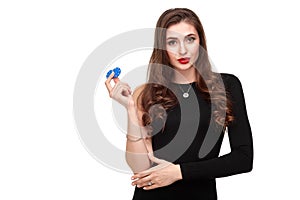 curly hair brunette posing with chips in her hands, poker concept isolation on white background