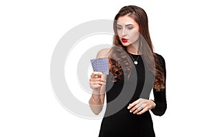 curly hair brunette posing with two aces cards in her hands, poker concept isolation on white background