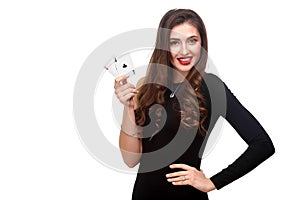 curly hair brunette posing with two aces cards in her hands, poker concept isolation on white background