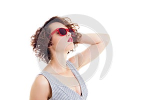 Curly hair woman wearing sunglasses