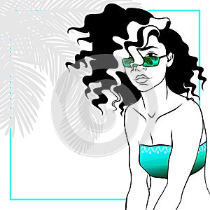 Curly haired woman in bikini photo