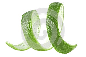 Curly lime peel twist. Lime fruit peel isolated on white background
