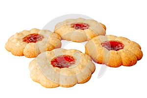 curly vanilla cookies with berry jam on a white plate