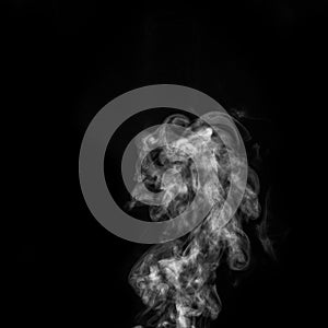Curly white steam, Fog or smoke isolated transparent special effect on black background. Abstract mist or smog