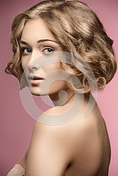 Curly woman with bob hair-cut