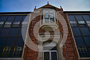 Curran historic school building on a snowy day in Rhinelander photo