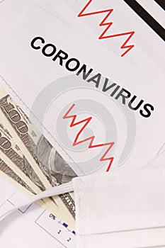 Currencies dollar with downward graphs representing financial crisis caused by coronavirus. Covid-19