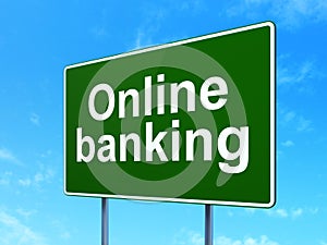 Currency concept: Online Banking on road sign background