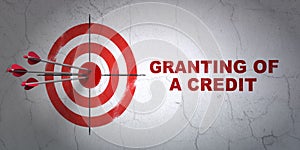 Currency concept: target and Granting of A credit on wall background