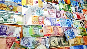 Currency of different countries background. Colorful banknotes of different countries as background close up