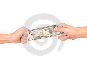 Currency tug-of-war concept for business rivalry. Two businessman fighting over dollar bill.