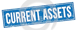 CURRENT ASSETS text on blue grungy rectangle stamp