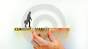 Current market turmoil symbol. Concept words Current market turmoil on wooden blocks on a beautiful white table white background.