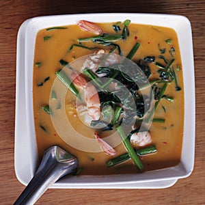 Curri soup with shrimps sea food grass cocoa milk photo