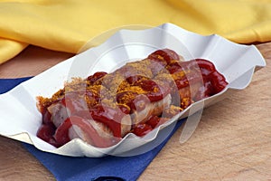 Curried sausage with ketchup