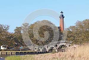 The Currituck Beach Lighthouse and wooden bridge near Corolla, North Carolina