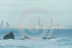 Currumbin rock with Gold Coast City as background