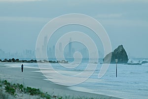 Currumbin rock with Gold Coast City as background