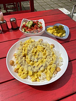 Curry Chicken with Rice Pilaf or Pilav served at Traditional Turkish Restaurant