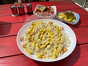 Curry Chicken with Rice Pilaf or Pilav served at Traditional Turkish Restaurant