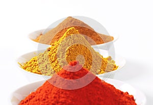 Curry powder, paprika and ground cinnamon