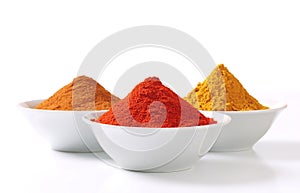 Curry powder, paprika and ground cinnamon