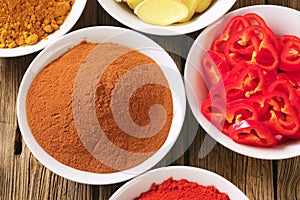 Curry powder, paprika, ground cinnamon, sliced ginger root and