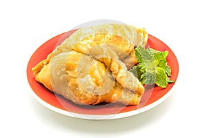 Curry Puffs in a red plate