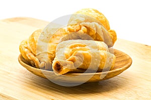 Curry Puffs in wooden plate