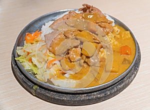 Curry and salad with pork cutlet