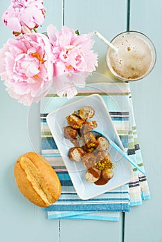 Currywurst with bread roll