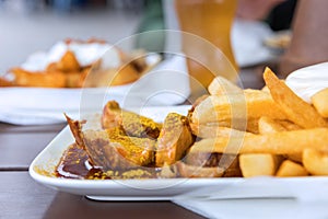 Currywurst and french fries menu