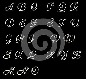 Cursive latin letters on black background