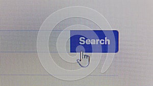 The cursor on the screen on the SEARCH button is pointing.