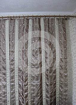 Curtain hanging on wooden curtain rod