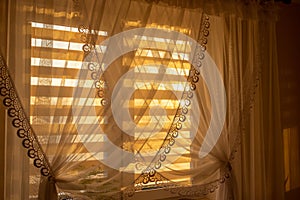 Curtain interior sunset. House room. run lighting through transparent curtain on window into bedroom at evening sunny day