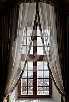 Curtain before old window