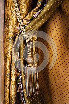 Curtain with an ornament