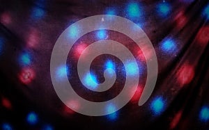 Curtain with red and blue spots