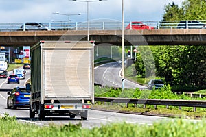 Curtain side van truck on uk motorway in fast motion