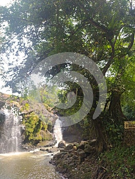 Curug Tomo Indonesia waterfall tourist attractions photo