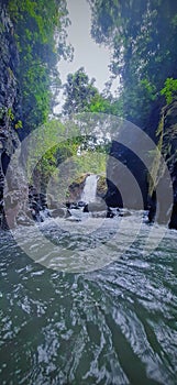 Curuk gendang a water fall in java indonesia photo