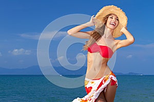 Curvaceous woman in bikini