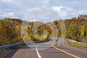 Curve in Highway 61 along north shore of Lake Superior in Minnesota on a bright autumn day